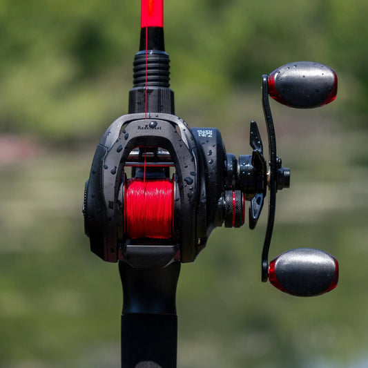 Reaction Tackle ReactCast Baitcasting Reel with red spool and line, black gray body on Tampa Home & Garden Store