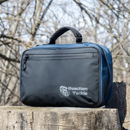 Reaction Tackle Splash Proof Bait Binder bag, blue with black carry handle, Reaction Tackle logo on Tampa Home & Garden Store