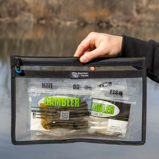 Reaction Tackle storage bag Pak water-resistant, black fabric with blue stitching and zipper logo on Tampa Home & Garden Store
