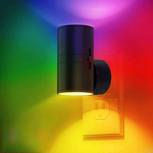 Plug-In Dimmable LED Night Light With Auto Sensor black cylindrical unit emits warm yellow light on Tampa Home & Garden Store