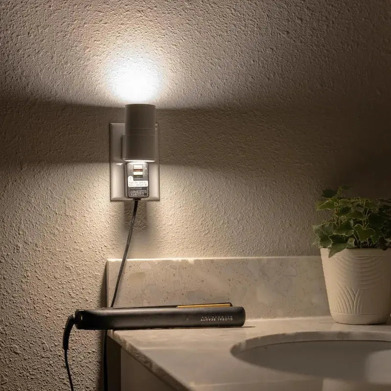 Plug-In Night Light with dusk-to-dawn sensor, white Moktan Sabai, wall outlet near plant on Tampa Home & Garden Store