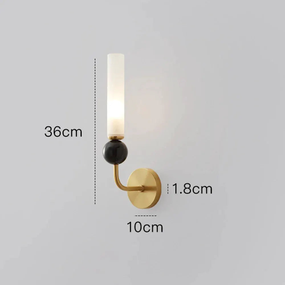 Modern wall sconce brass finish with frosted glass shade and black orb for foyer on Tampa Home & Garden Store