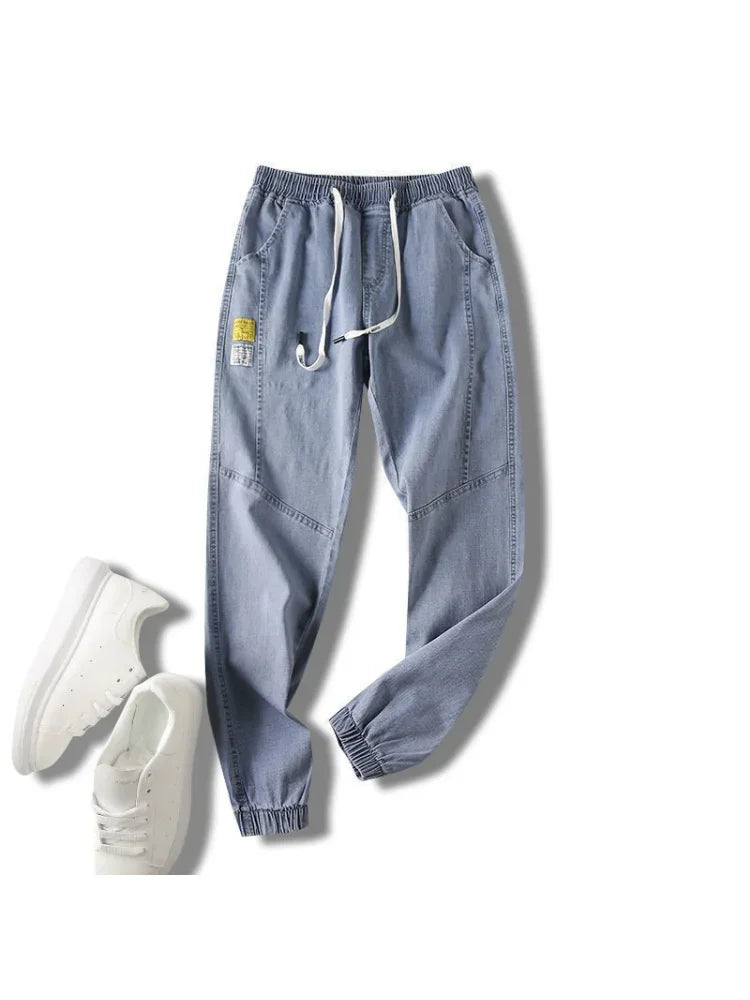 Men's light blue denim wide-leg jeans with drawstring waist, baggy streetwear pants on Tampa Home & Garden Store