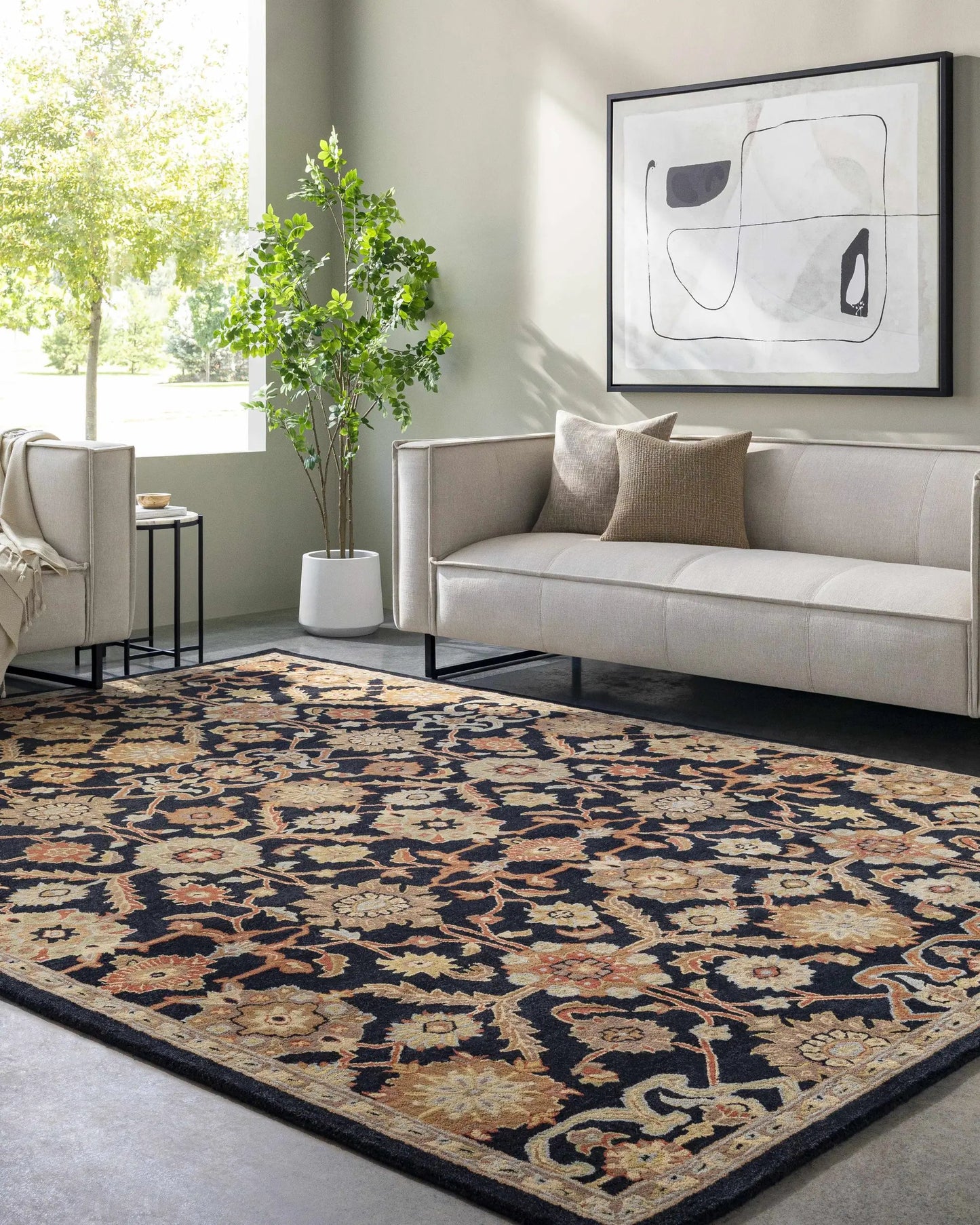 Salix Hand Tufted Black Wool Rug Pattern by Boutique Rugs in living room with floral motif on Tampa Home & Garden Store
