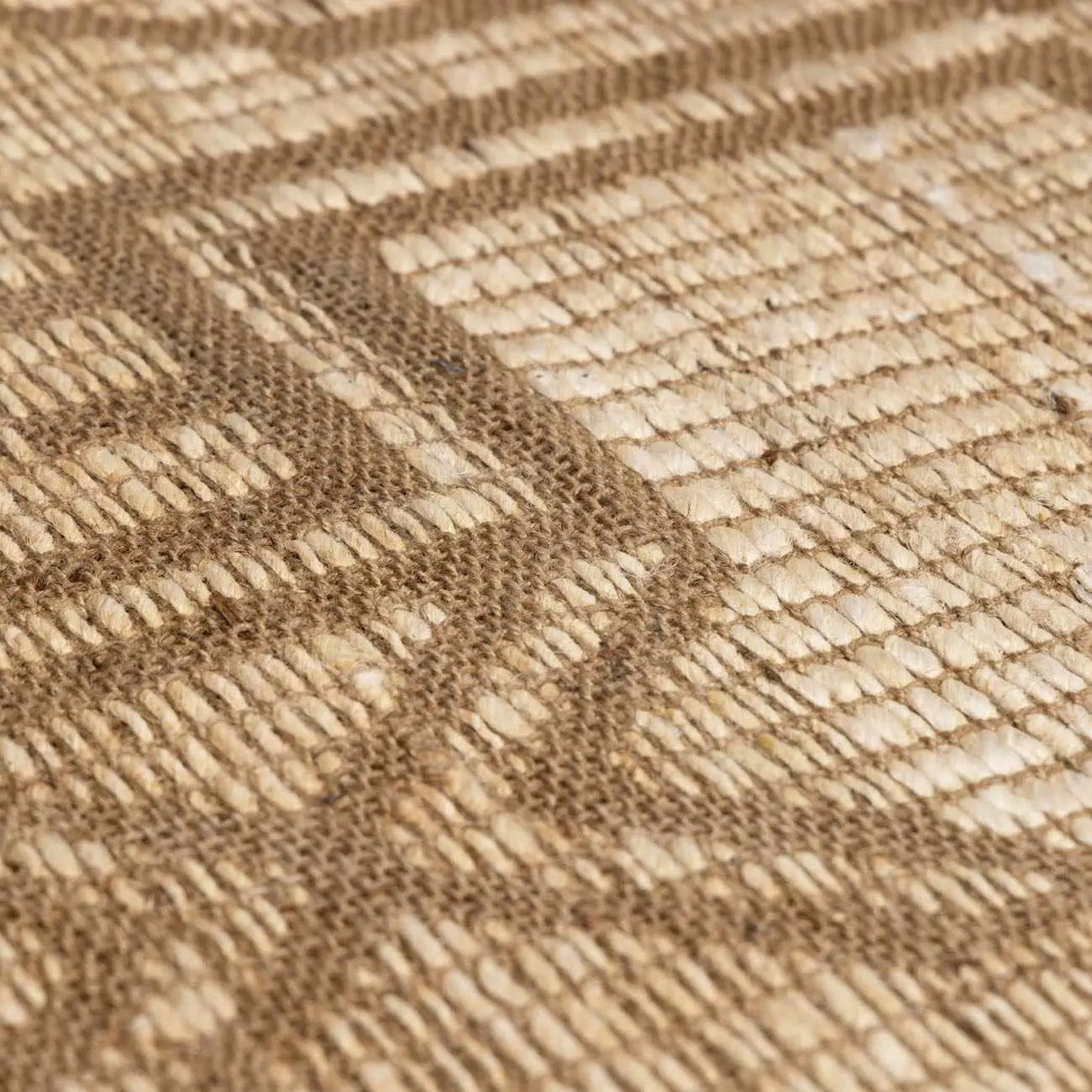 Ndoki Hand Woven Jute Rug in beige and taupe, natural textured rug by Boutique Rugs on Tampa Home & Garden Store
