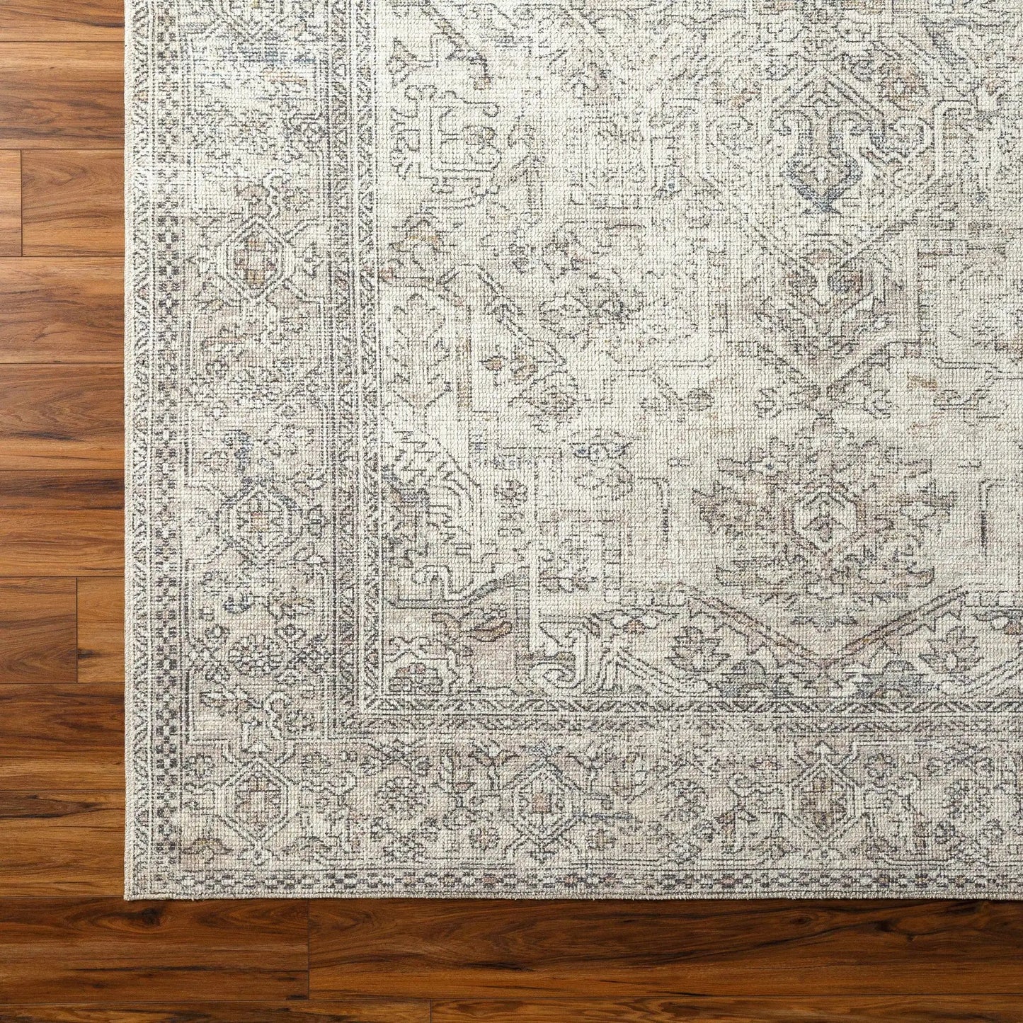 Margot Woven Rug by Boutique Rugs in cream with soft blue distressed pattern on Tampa Home & Garden Store