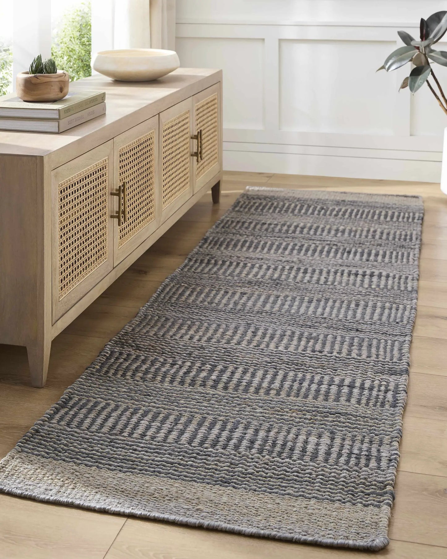 Navy Elle Jute Rug hand woven in India, blue-gray textured jute for living rooms on Tampa Home & Garden Store