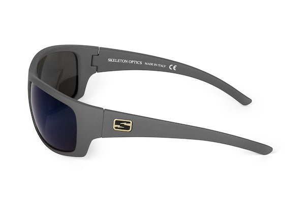 Renegade sunglasses Skeleton Optics wolf gray frame with dark lenses and gold S logo on temple on Tampa Home & Garden Store
