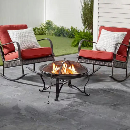 Bronze 30-inch steel fire pit by HomePacific with mesh cover on a stone patio on Tampa Home & Garden Store