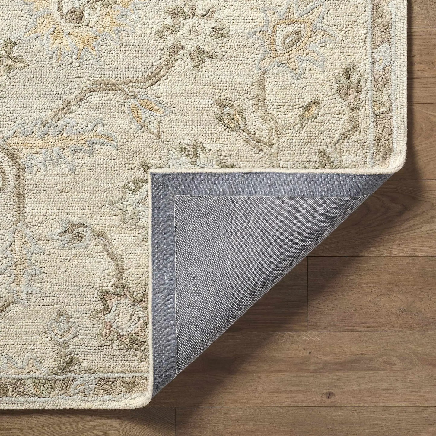 Adelle Hand Tufted Oushak beige wool area rug Boutique Rugs; tones with blue-gray motifs on Tampa Home & Garden Store