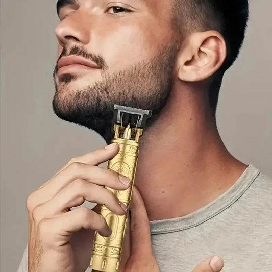Hair clipper and beard trimmer Moktan Sabai USB rechargeable gold finish in use on a man's beard on Tampa Home & Garden Store