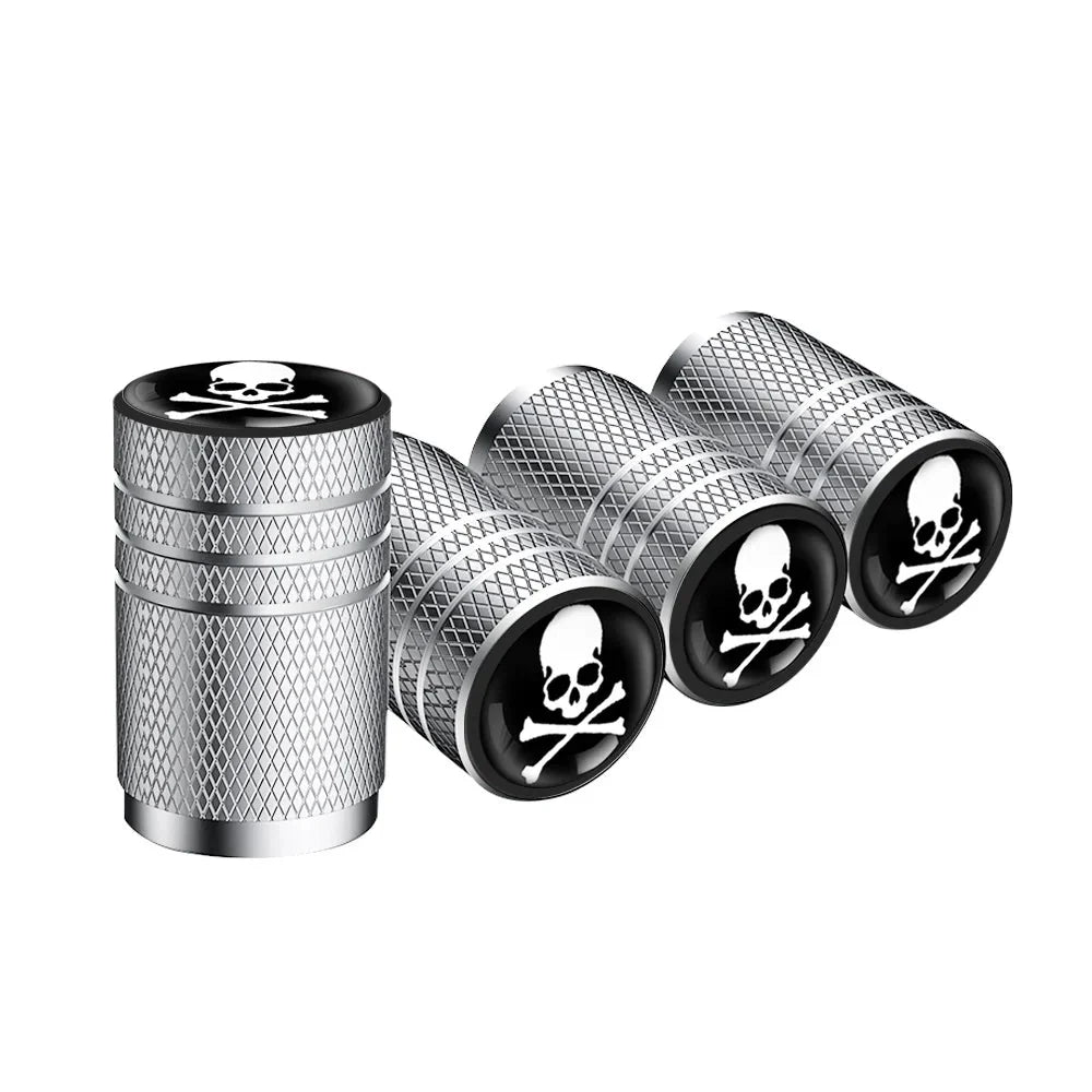 4pc skull valve stem caps set, silver knurled metal caps with black skull emblem on Tampa Home & Garden Store