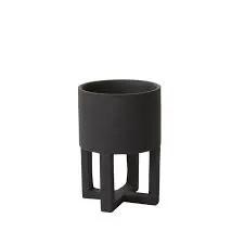 Santurce footed pot planter in matte black with simple open-frame base for indoor decor on Tampa Home & Garden Store