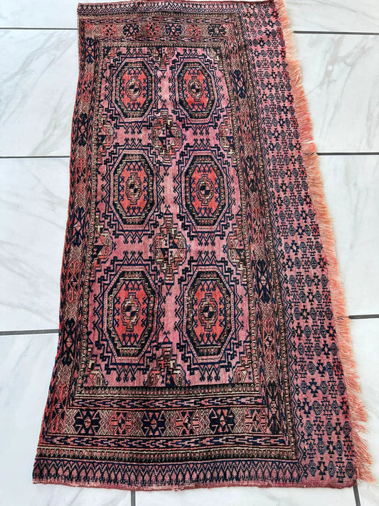 Saryk Turkmen Trapping Torba rug 53 by 25 in pink with navy geometric medallions and fringe on Tampa Home & Garden Store