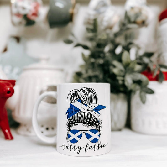 Sassy Lassie Messy Bun 11oz ceramic mug with a blue bow portrait on white ceramic on Tampa Home & Garden Store