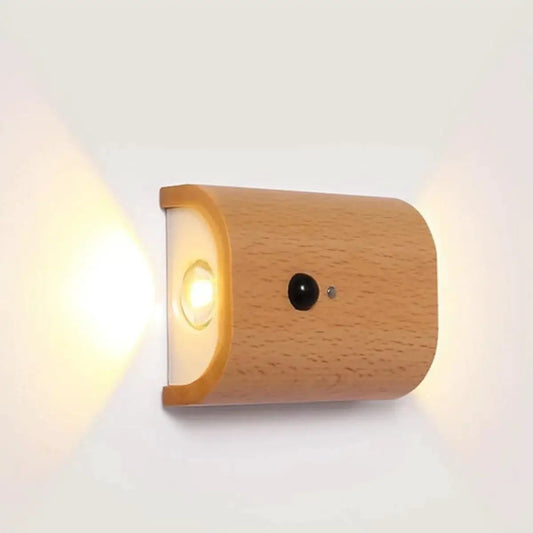 Rechargeable motion sensor wall light in warm wood finish by Moktan Sabai on Tampa Home & Garden Store