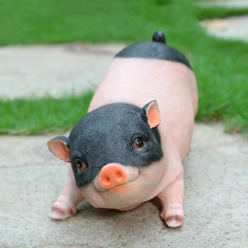 Perfecsy pink piggy resin statue with black face for garden decor on Tampa Home & Garden Store