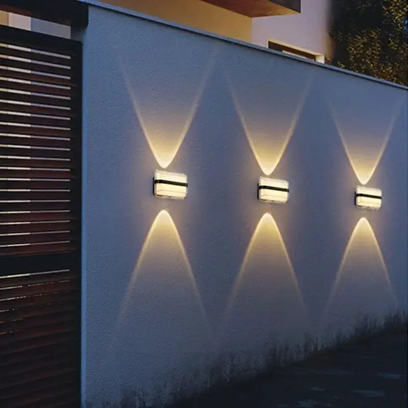 IP65 Waterproof Outdoor Wall Light Round Lamp three warm white LED fixtures on white wall on Tampa Home & Garden Store