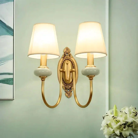 American copper wall lamp dual-arm sconce with ceramic bases and white fabric shades on Tampa Home & Garden Store