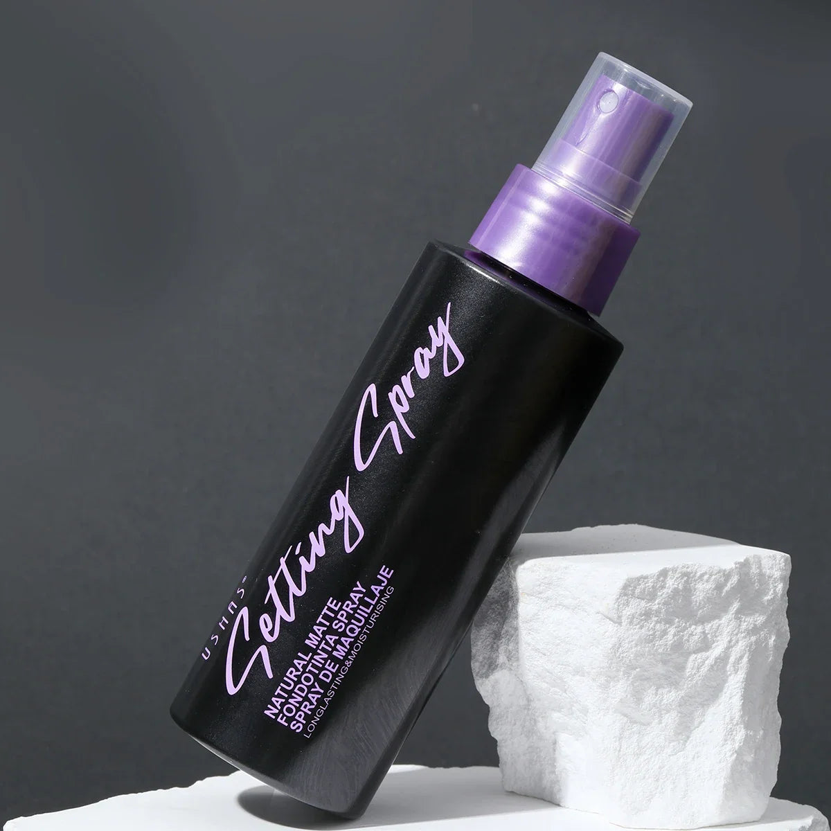 USHAS Waterproof Makeup Setting Spray Silcy Skin black matte bottle lavender cap on Tampa Home & Garden Store