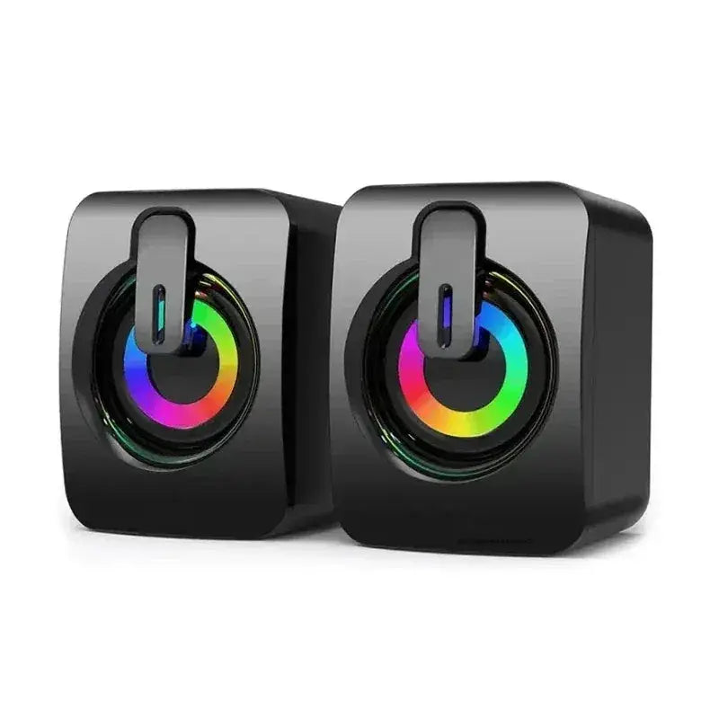 Two black desktop computer speakers with rainbow RGB ring lighting for stereo setup on Tampa Home & Garden Store