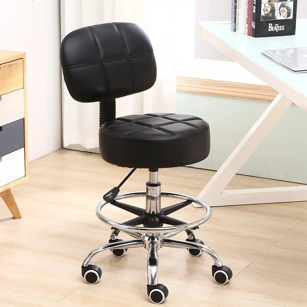 Swivel PU leather drafting chair with black padded seat and back, chrome base and caster wheels on Tampa Home & Garden Store