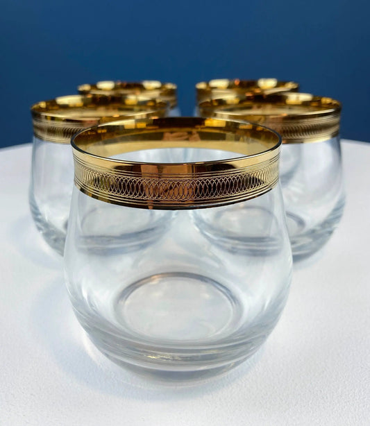 Set of 5 stemless whiskey glasses with gold rims and decorative lattice band on Tampa Home & Garden Store
