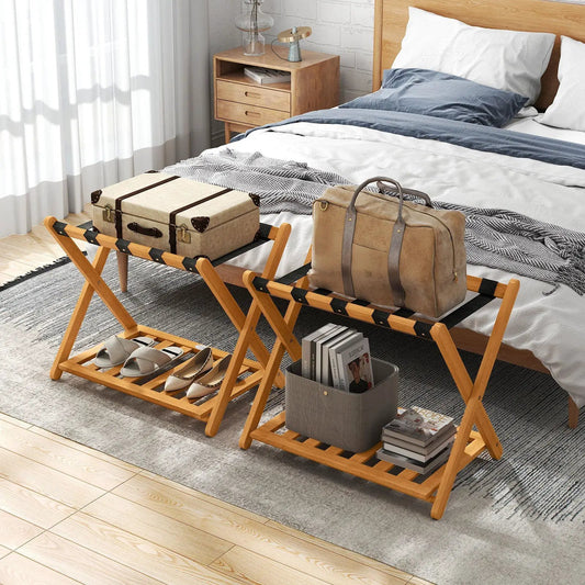 Set of 2 folding luggage racks with slatted shelf holding beige suitcase and tan duffel on Tampa Home & Garden Store