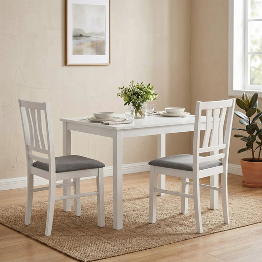 Upholstered dining chairs with white wood frames and gray cushions around a white table set of 2 on Tampa Home & Garden Store