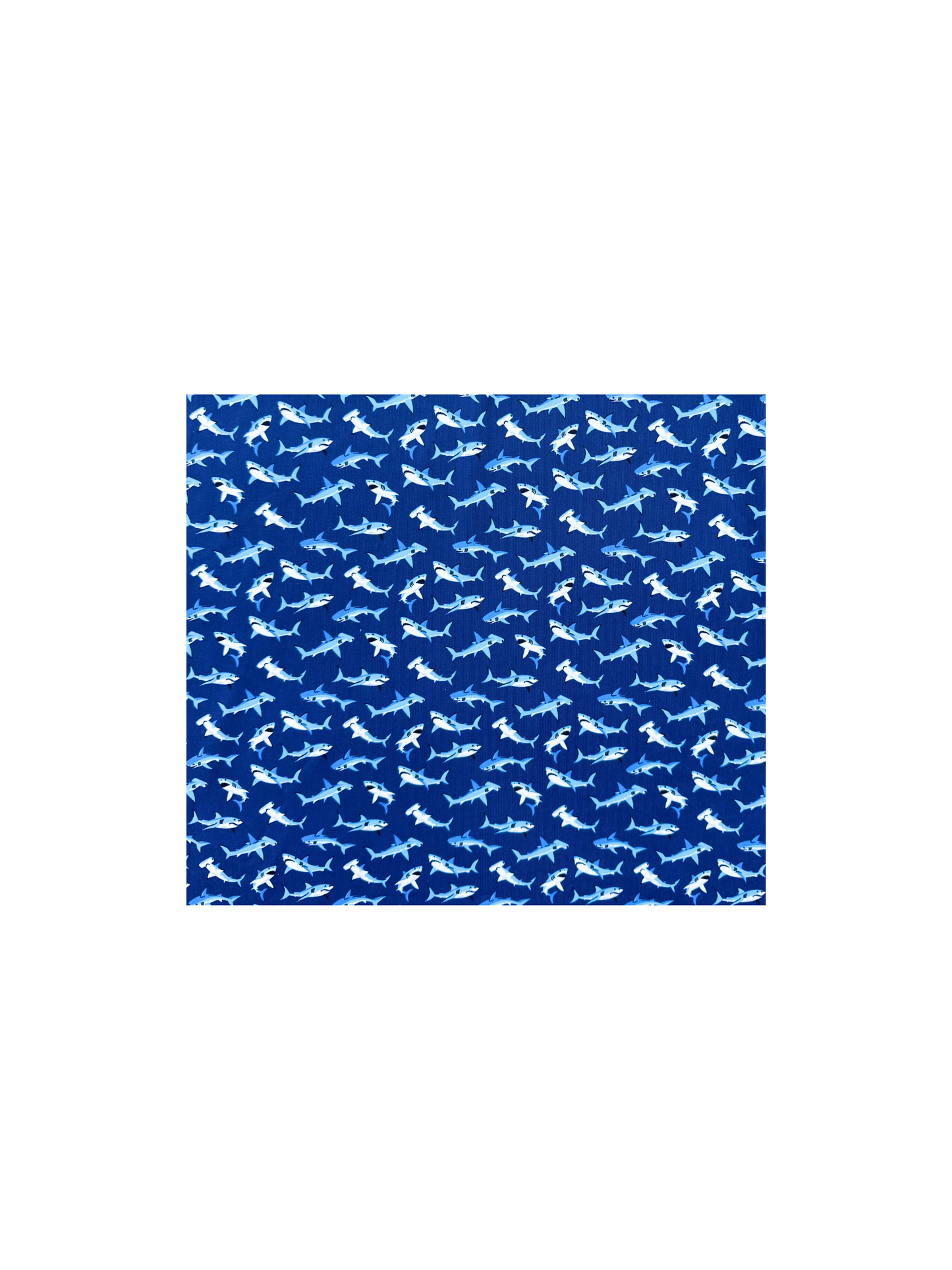 Sharks Polo by White Water Life on blue background featuring a repeating pattern of white sharks on Tampa Home & Garden Store