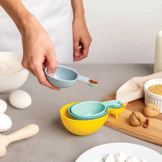 Shelly measuring cups and spoons set in yellow and teal with nesting design OTOTO DESIGN on Tampa Home & Garden Store