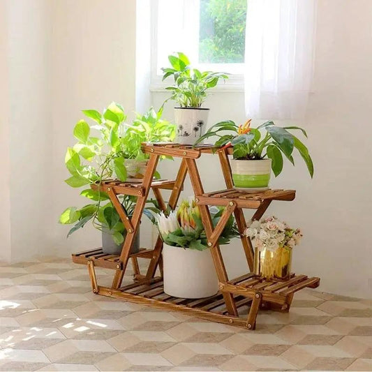 Solid wood triangular 6-shelf plant stand in natural brown holding several potted plants on Tampa Home & Garden Store