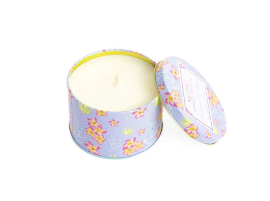 Southernmost Breeze Travel Tin Candle in lilac floral hibiscus pattern tin with matching lid on Tampa Home & Garden Store