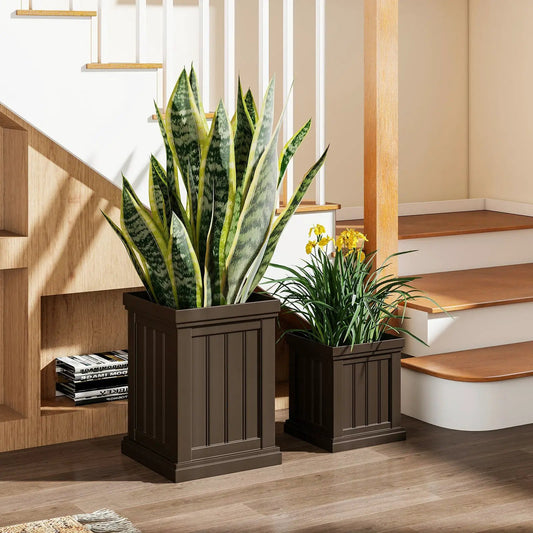 Brown plastic square planters set of 2 with panels housing a snake plant and another plant on Tampa Home & Garden Store