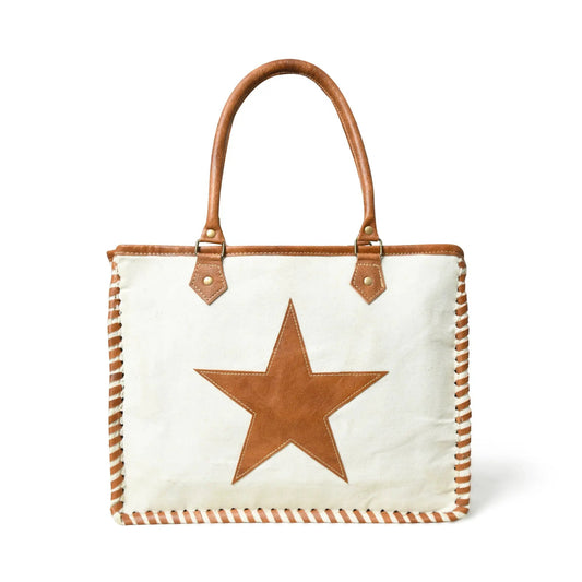 Star Upcycled Canvas Tote with Leather Accents white canvas bag with brown leather star and handles on Tampa Home & Garden Store