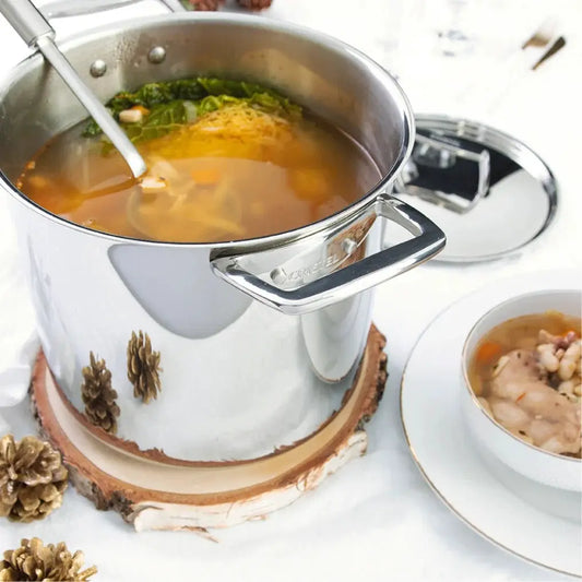 Stockpot with lid CRISTEL USA, polished stainless steel, chef designed, soup visible in pot on Tampa Home & Garden Store