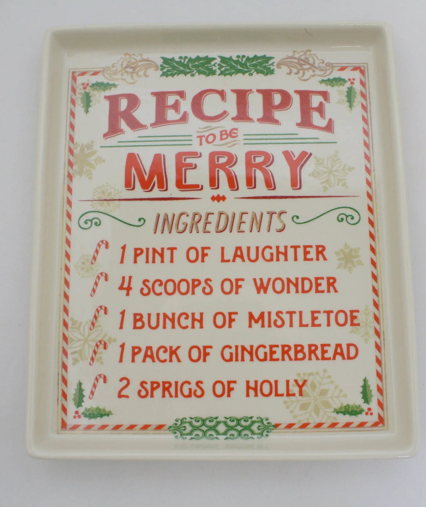Stoneware recipe plate Be Merry spoon rest white ceramic with red green holiday print border on Tampa Home & Garden Store