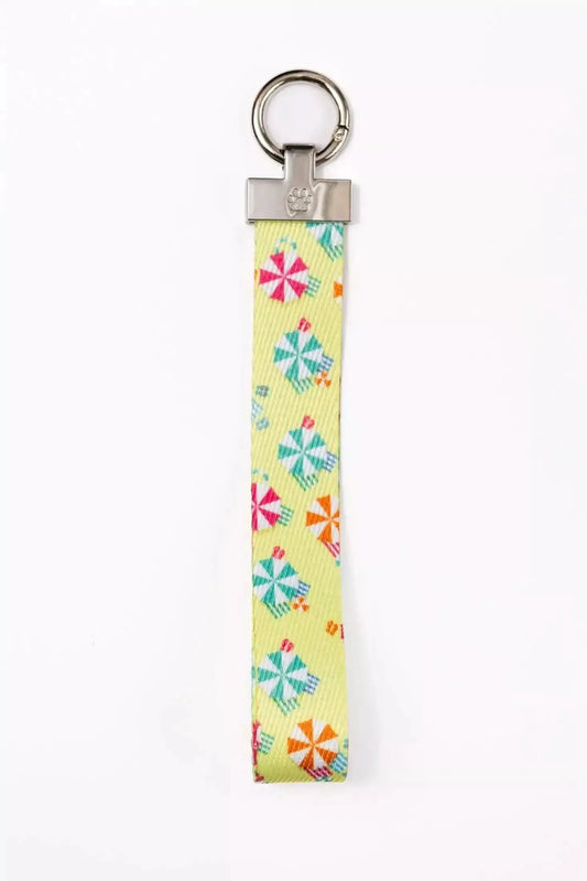 Sun and Shade Wristlet Keychain yellow strap with pinwheels, silver cross, Aria Fox on Tampa Home & Garden Store