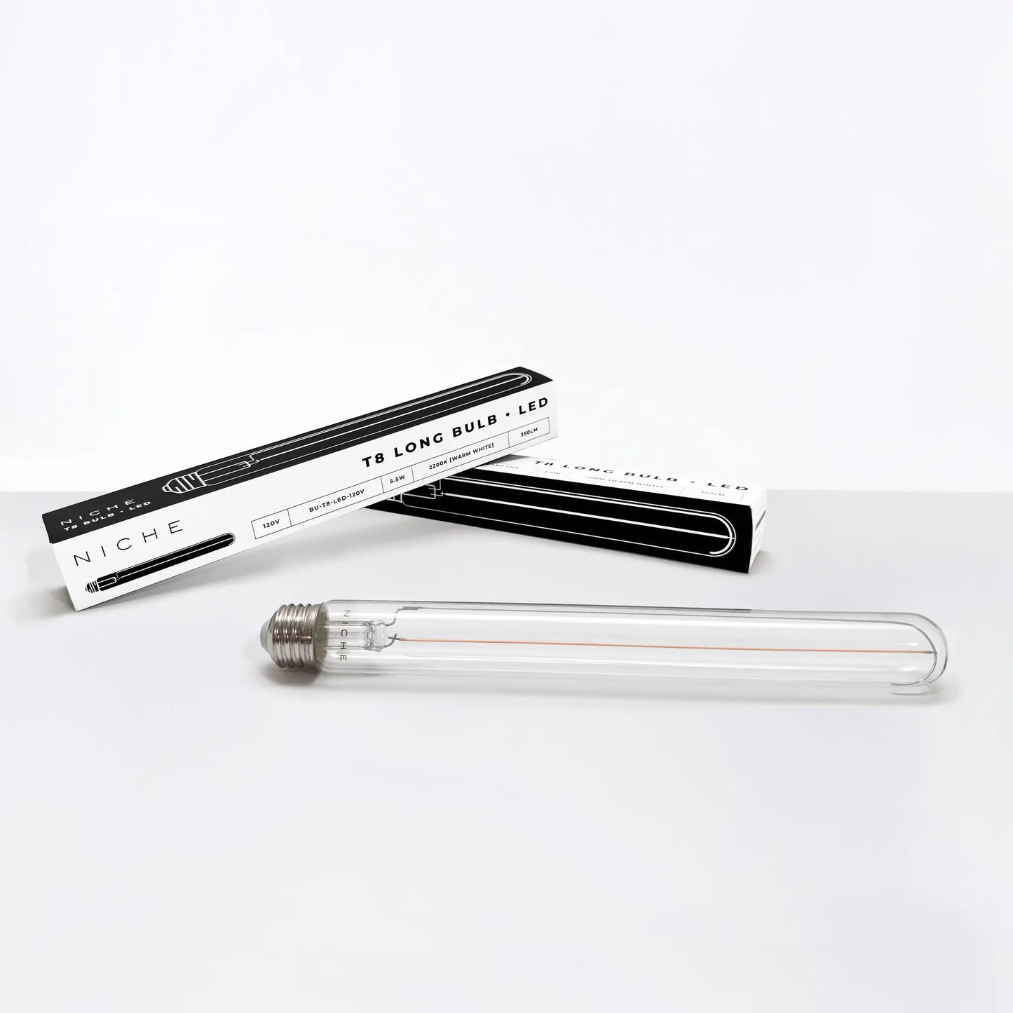 Niche T8 Long LED Bulb packaging with two black and white boxes and LED tube on Tampa Home & Garden Store