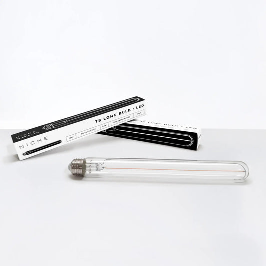 Niche T8 Long LED Bulb packaging with two black and white boxes and LED tube on Tampa Home & Garden Store