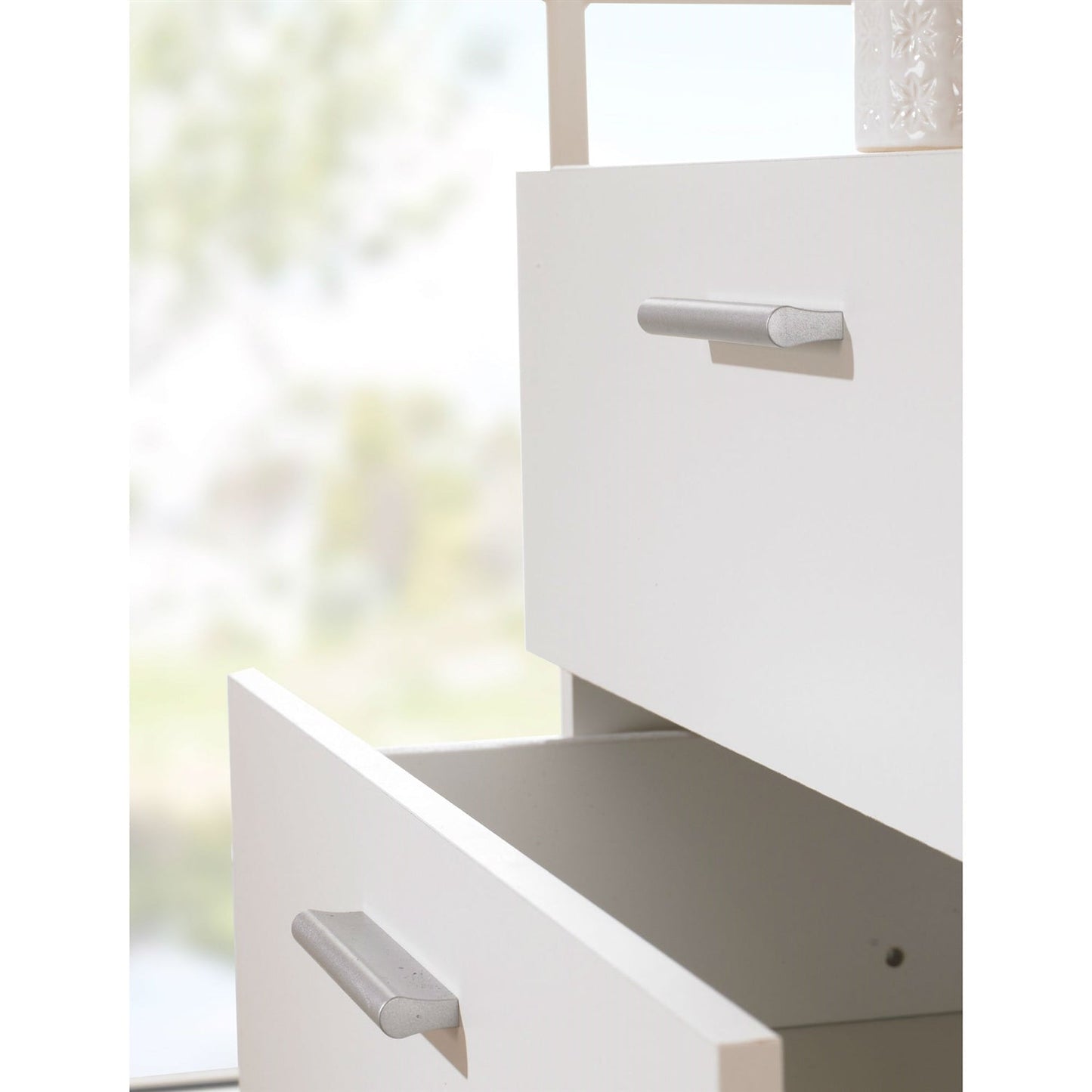 Cómoda de dormitorio de 4 cajones blanca de estilo contemporáneo