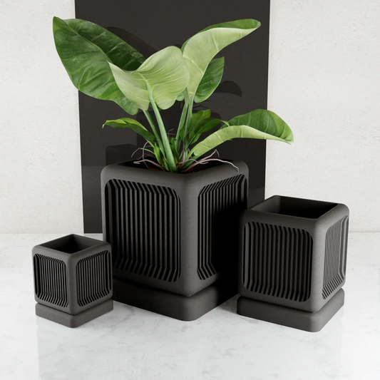 Box Planter set in small, medium, and large sizes; gray vented planters with green leaves on Tampa Home & Garden Store