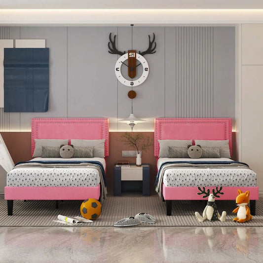 Twin pink upholstered platform beds set of 2 with nailhead trim headboards in a kids room on Tampa Home & Garden Store