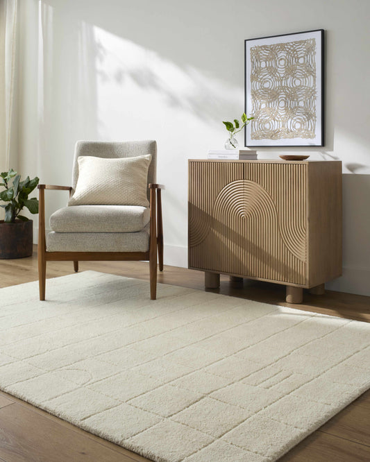 Tuuka Silver Beige Area Rug by Boutique Rugs in a serene living room on Tampa Home & Garden Store