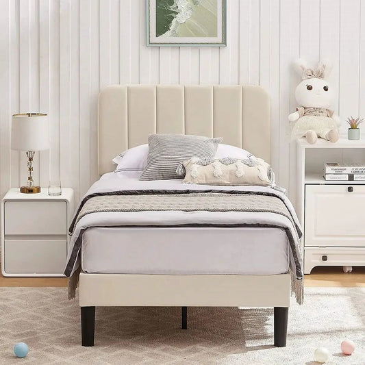 Twin beige upholstered platform bed with tall paneled headboard in a neutral bedroom setup on Tampa Home & Garden Store