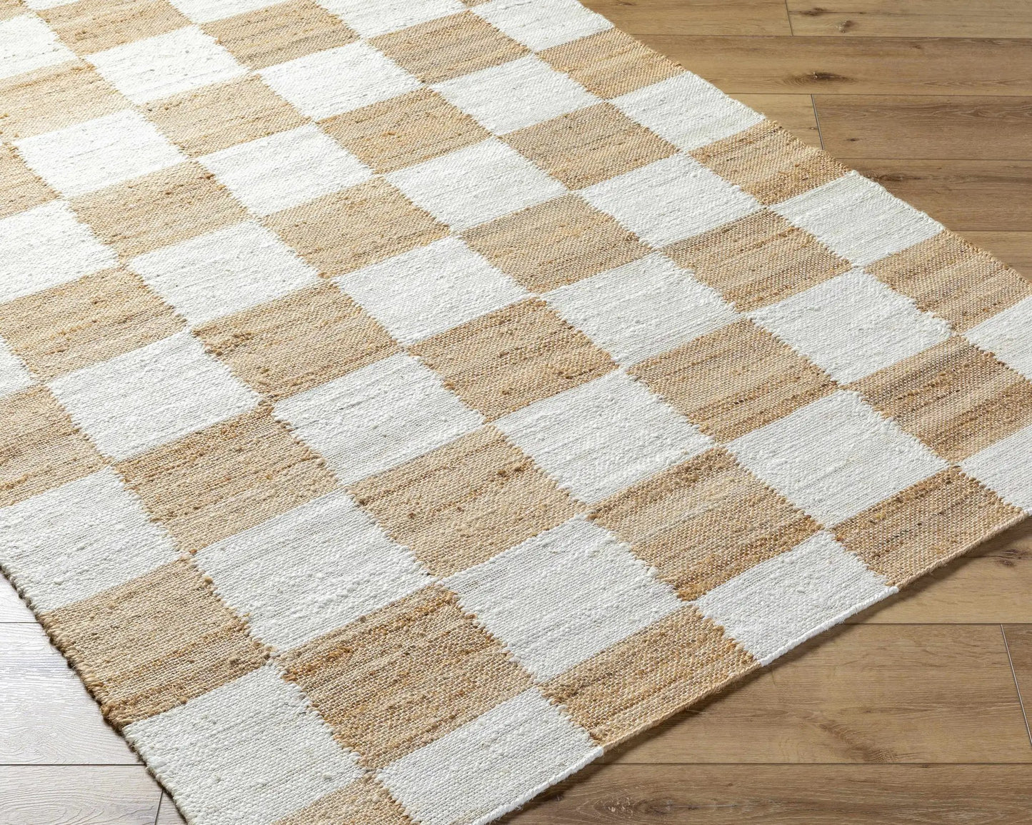 Kamey Becki Owens x Livabliss Boky 2302 area rug in tan ivory checkered on wood floor on Tampa Home & Garden Store
