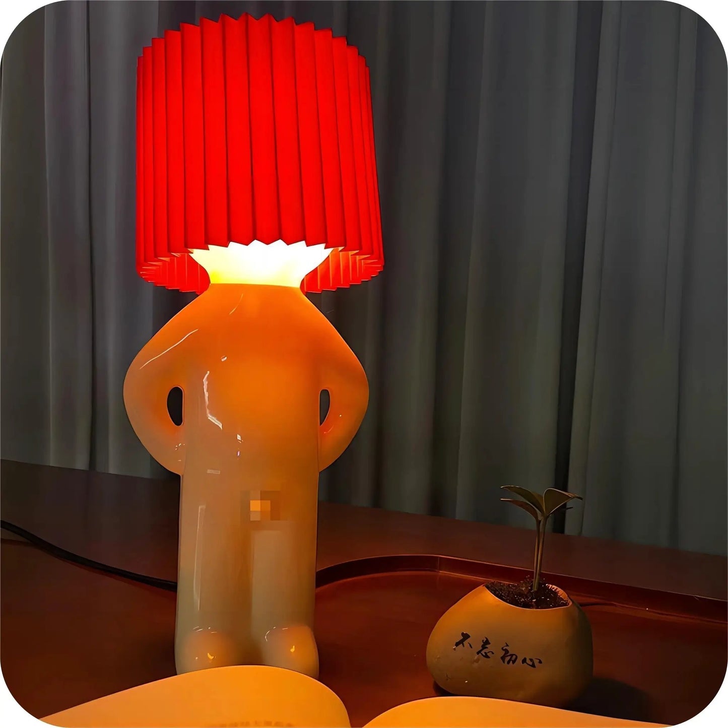 Human-shaped table lamp with orange body wireless novelty light on Tampa Home & Garden Store