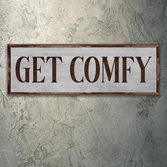 Get Comfy Sign canvas crafting display with rustic brown frame on light wood Tailored Canvases on Tampa Home & Garden Store