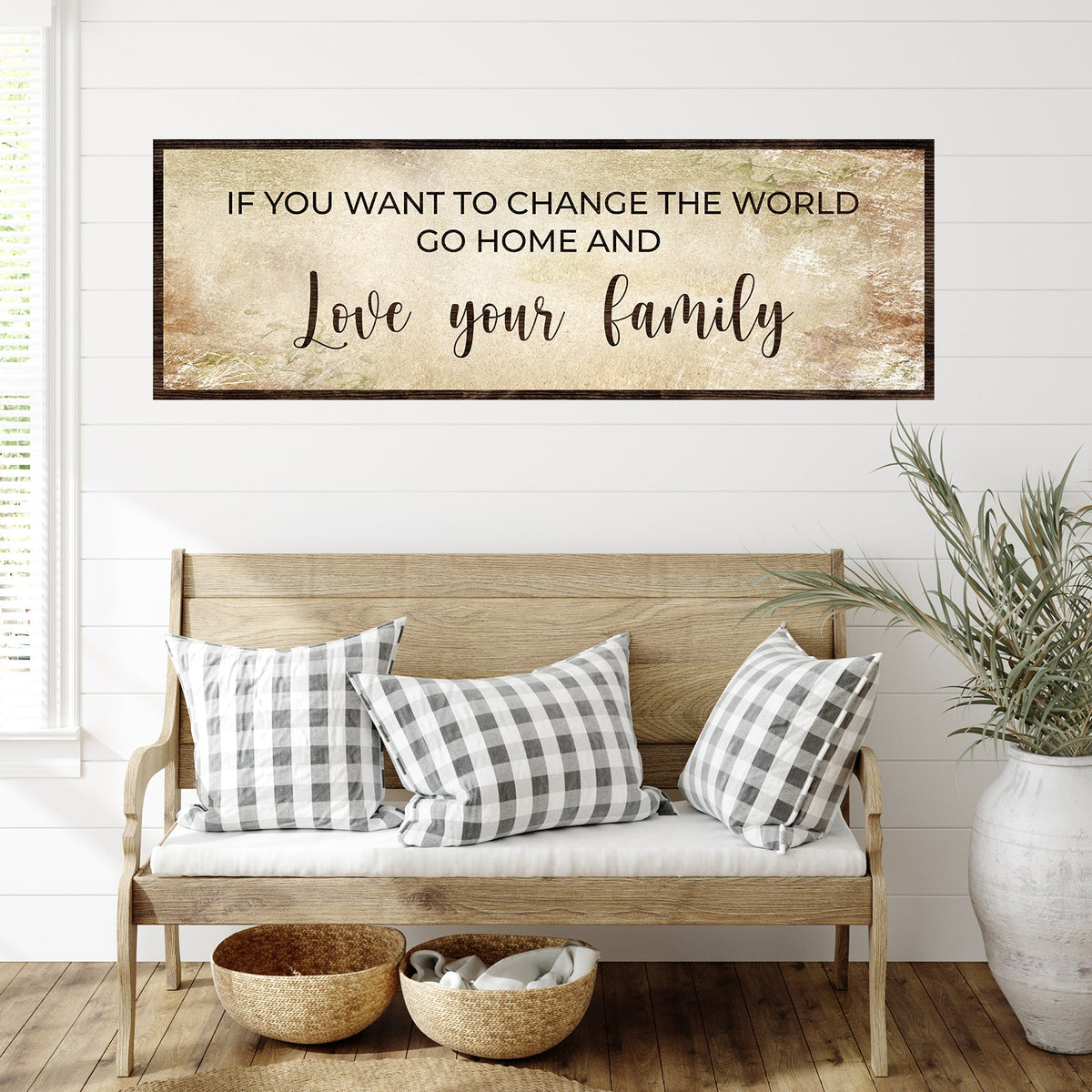 Go Home And Love Your Family Sign III canvas with dark wood frame above bench on Tampa Home & Garden Store
