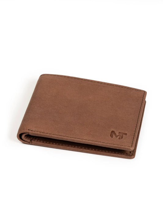 Tan brown slate wallet with matte finish, stitched edges, MT embossed logo on Tampa Home & Garden Store